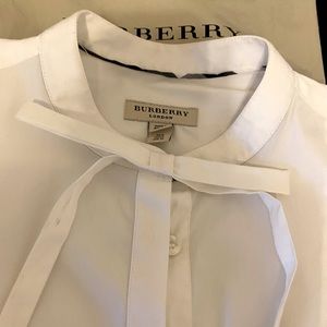 Burberry brand , 100% Cotton blouse Size 6 .